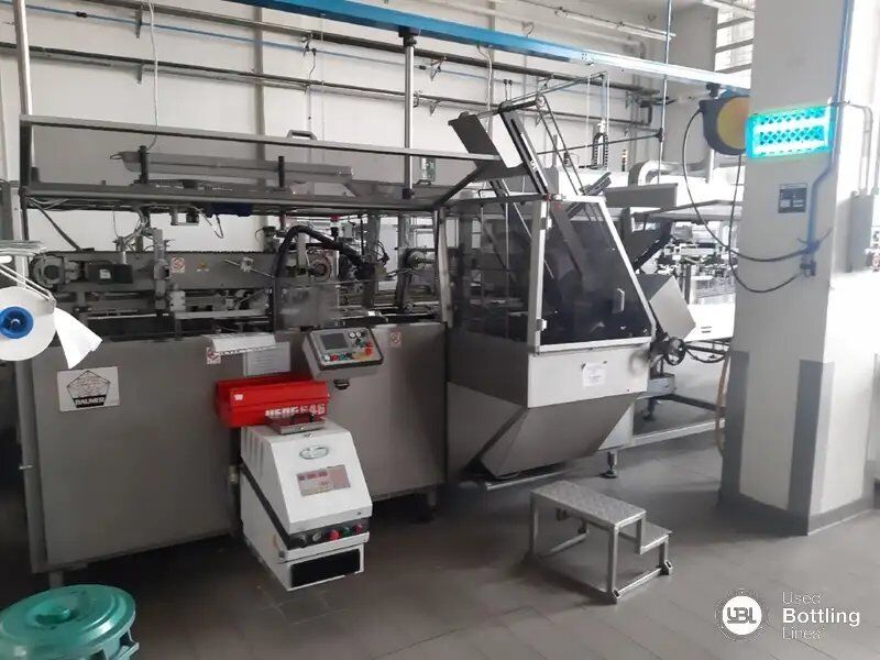 Used Baumer Wrap Around Packer 2003 - Упаковочное оборудование: фото 3 Used Baumer Wrap Around Packer 2003 - Упаковочное оборудование: фото 3