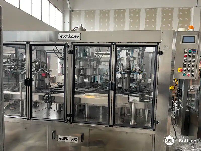 Used Capsuling Machine Nortan Prisma 2003 - Оборудование для производства напитков: фото 1 Used Capsuling Machine Nortan Prisma 2003 - Оборудование для производства напитков: фото 1