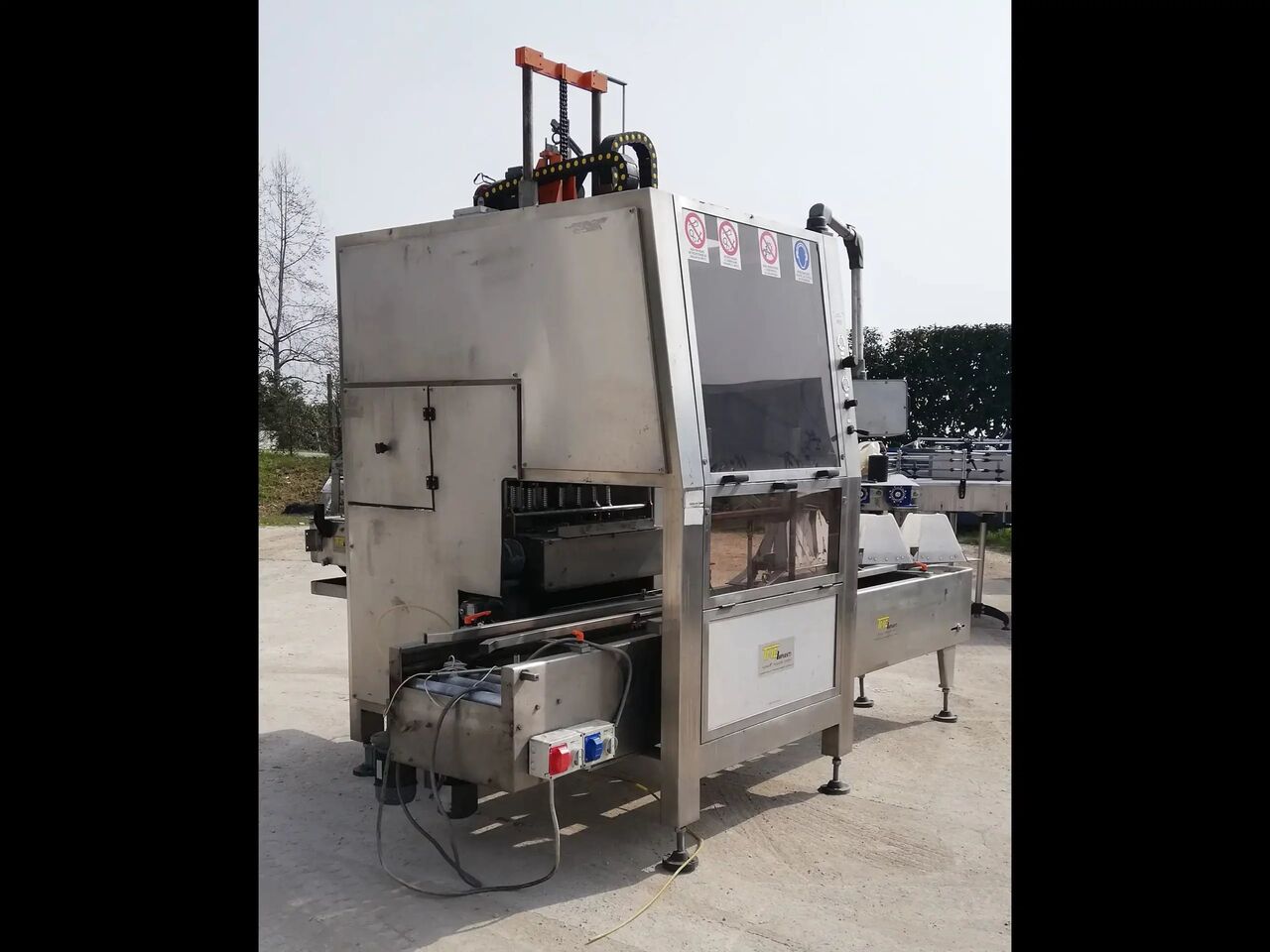 Used Case Packer TMG P80 4200 bph - Упаковочное оборудование: фото 4 Used Case Packer TMG P80 4200 bph - Упаковочное оборудование: фото 4