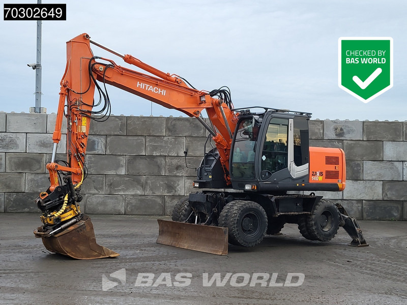 Hitachi ZX140W -3 - Колёсный экскаватор: фото 1 Hitachi ZX140W -3 - Колёсный экскаватор: фото 1