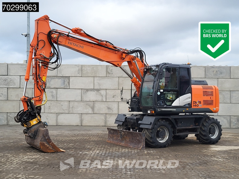 Hitachi ZX140W -5B Engcon Tiltrotator - Колёсный экскаватор: фото 1 Hitachi ZX140W -5B Engcon Tiltrotator - Колёсный экскаватор: фото 1