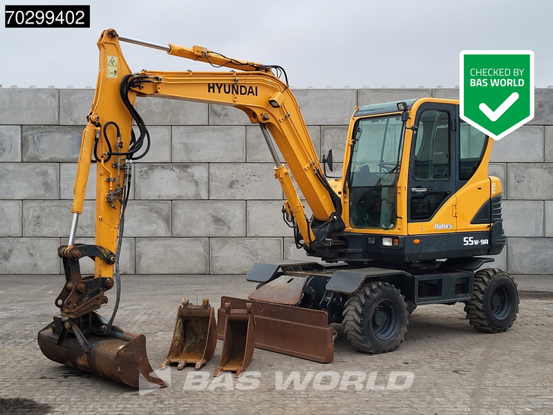 Hyundai Robex 55W-9A EPA - Колёсный экскаватор: фото 1 Hyundai Robex 55W-9A EPA - Колёсный экскаватор: фото 1