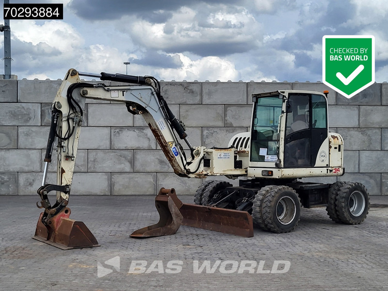 Terex TW85 - Колёсный экскаватор: фото 1 Terex TW85 - Колёсный экскаватор: фото 1