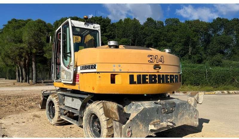 Liebherr A314 Litronic - Колёсный экскаватор: фото 2 Liebherr A314 Litronic - Колёсный экскаватор: фото 2