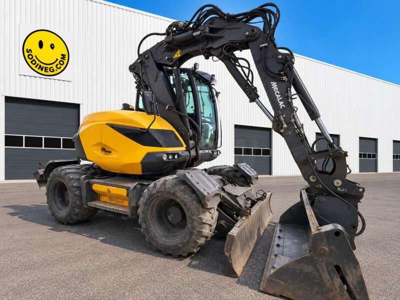 Mecalac 11 MWR + ROTOTILT - Колёсный экскаватор: фото 1 Mecalac 11 MWR + ROTOTILT - Колёсный экскаватор: фото 1