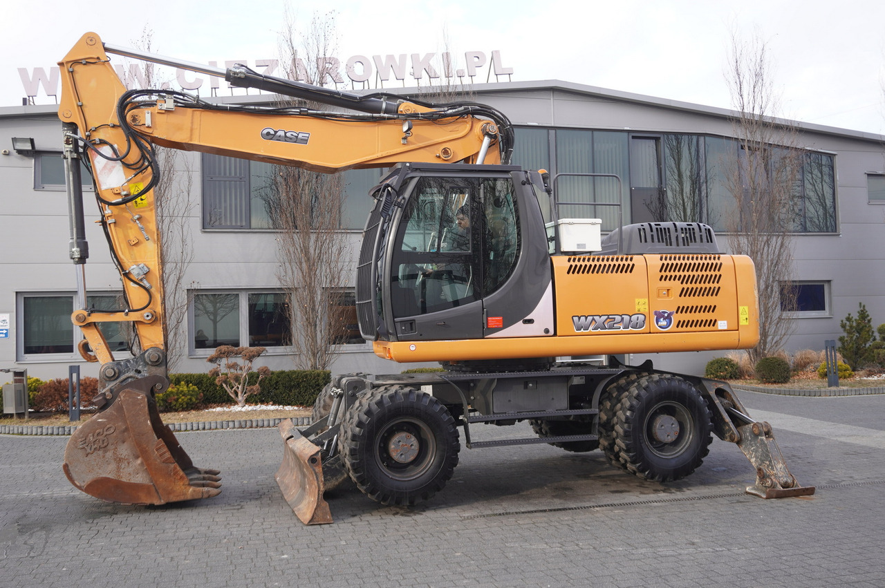 CASE WX218 / 23t wheeled excavator / 3 times folding arm - Колёсный экскаватор: фото 3 CASE WX218 / 23t wheeled excavator / 3 times folding arm - Колёсный экскаватор: фото 3