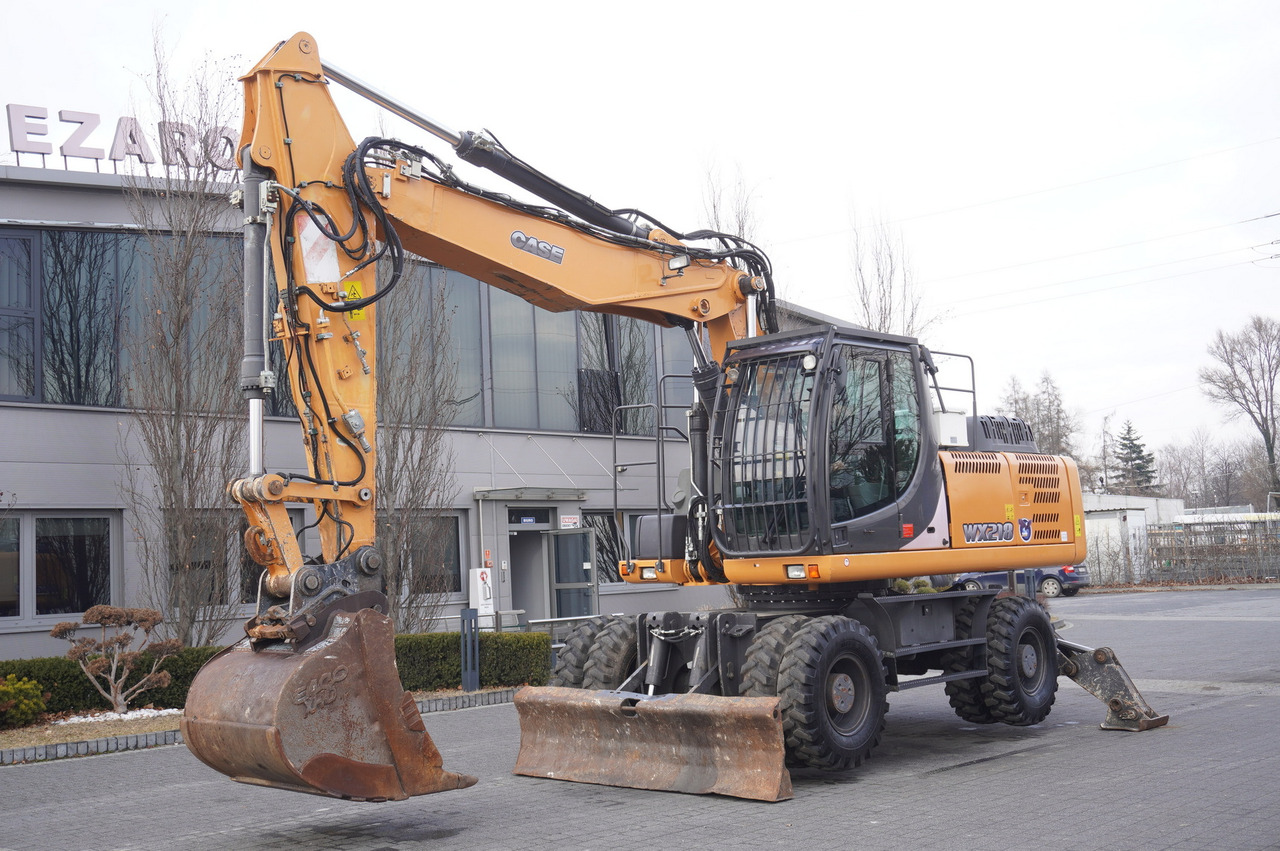 CASE WX218 / 23t wheeled excavator / 3 times folding arm - Колёсный экскаватор: фото 2 CASE WX218 / 23t wheeled excavator / 3 times folding arm - Колёсный экскаватор: фото 2