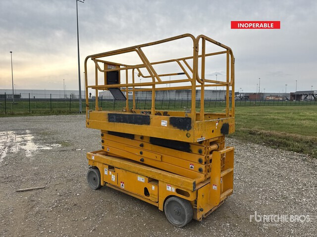 2006 Haulotte Compact 12 Electric (Inoperable) Scissor Lift - Ножничный подъемник: фото 1 2006 Haulotte Compact 12 Electric (Inoperable) Scissor Lift - Ножничный подъемник: фото 1