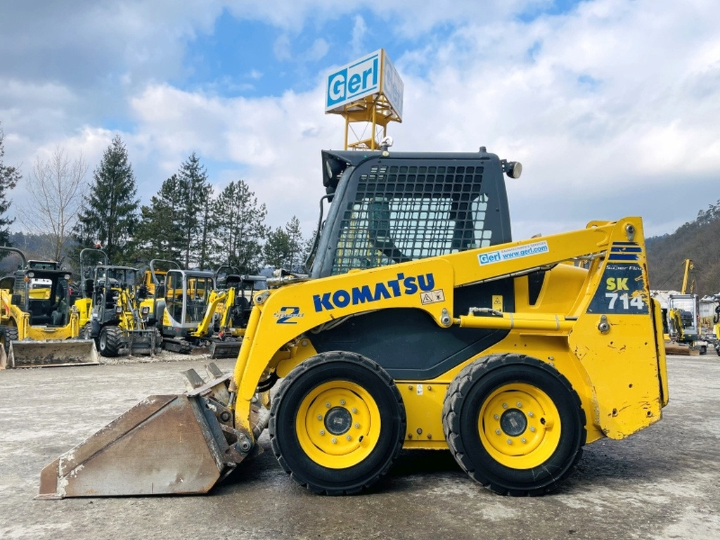 Komatsu SK714-5 (3948) - Мини-погрузчик с бортовым поворотом: фото 1 Komatsu SK714-5 (3948) - Мини-погрузчик с бортовым поворотом: фото 1