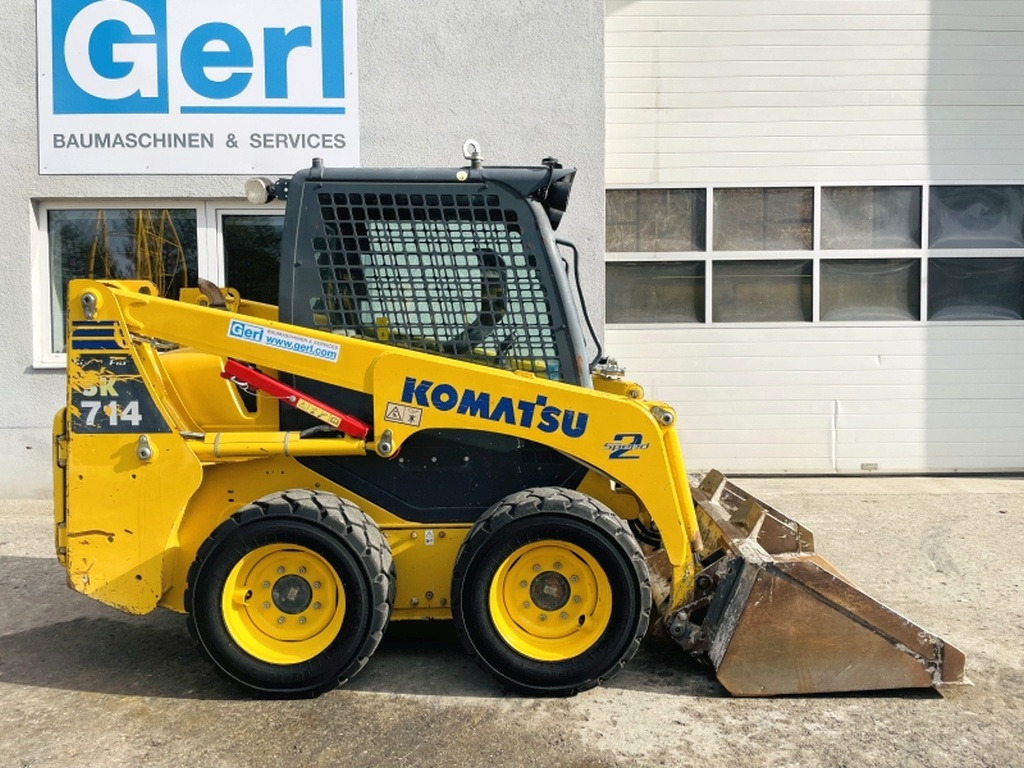 Komatsu SK714-5 (3948) - Мини-погрузчик с бортовым поворотом: фото 2 Komatsu SK714-5 (3948) - Мини-погрузчик с бортовым поворотом: фото 2