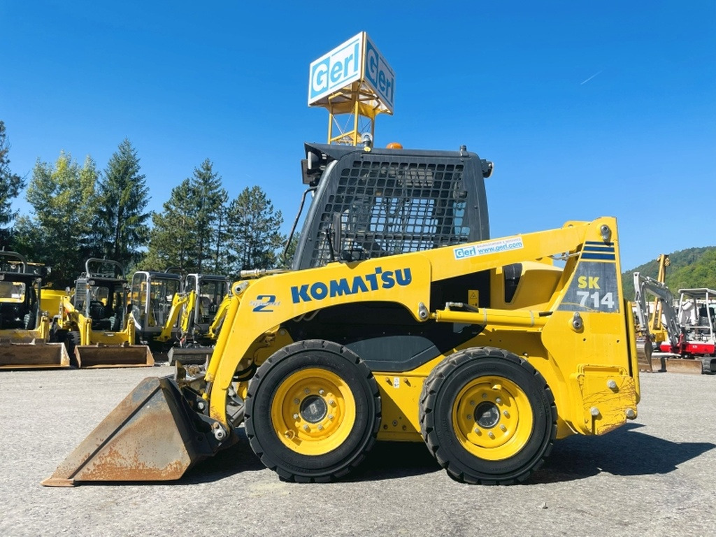 Komatsu SK714-5 (4065) - Мини-погрузчик с бортовым поворотом: фото 1 Komatsu SK714-5 (4065) - Мини-погрузчик с бортовым поворотом: фото 1