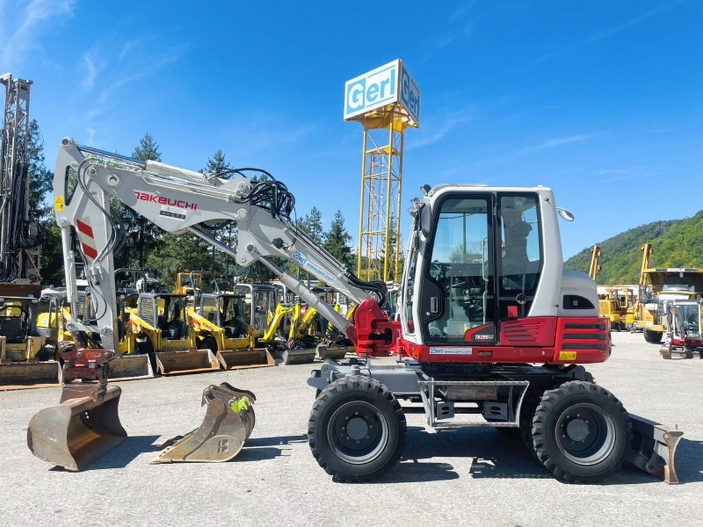 Takeuchi TB295W (4045) - Колёсный экскаватор: фото 1 Takeuchi TB295W (4045) - Колёсный экскаватор: фото 1