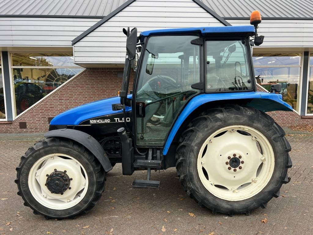 New Holland TL 90 trekker - Трактор: фото 2 New Holland TL 90 trekker - Трактор: фото 2
