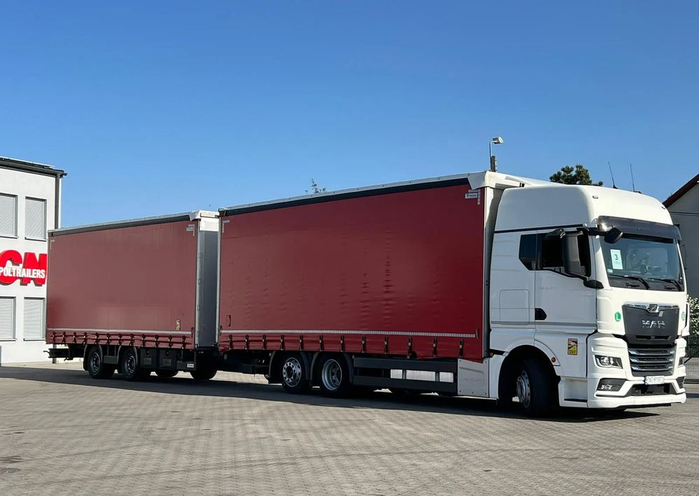 MAN TGX 26.470 z przyczepą Redos - Тентованный грузовик: фото 2 MAN TGX 26.470 z przyczepą Redos - Тентованный грузовик: фото 2