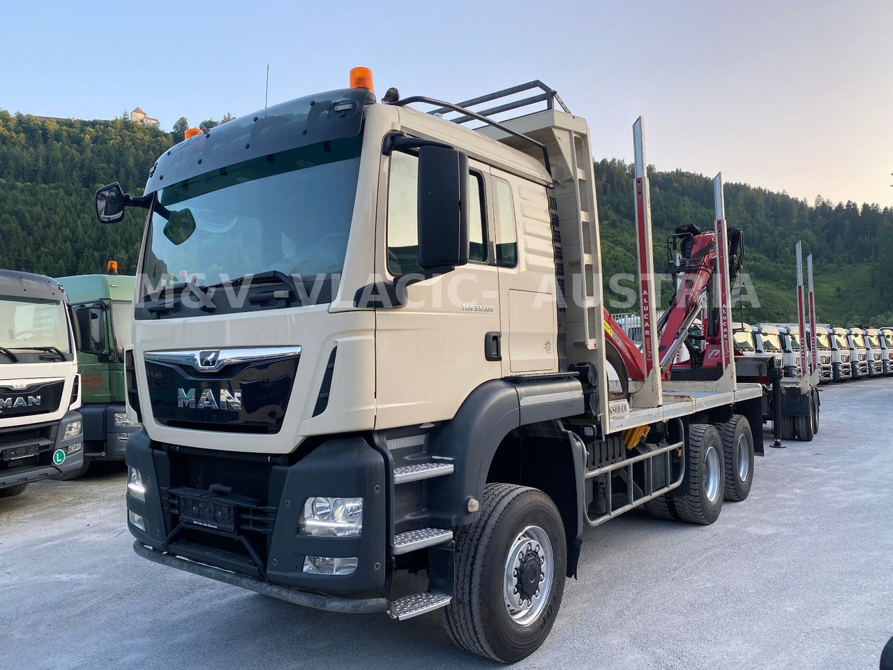 MAN 33.500 6X6 mit Kran PENZ 12Z - Лесовоз, Автоманипулятор: фото 1 MAN 33.500 6X6 mit Kran PENZ 12Z - Лесовоз, Автоманипулятор: фото 1