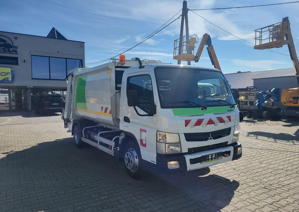 Mitsubishi Fuso Canter - Мусоровоз: фото 2 Mitsubishi Fuso Canter - Мусоровоз: фото 2