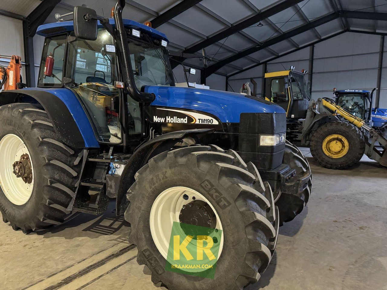 TM190 New Holland  - Трактор: фото 1 TM190 New Holland  - Трактор: фото 1