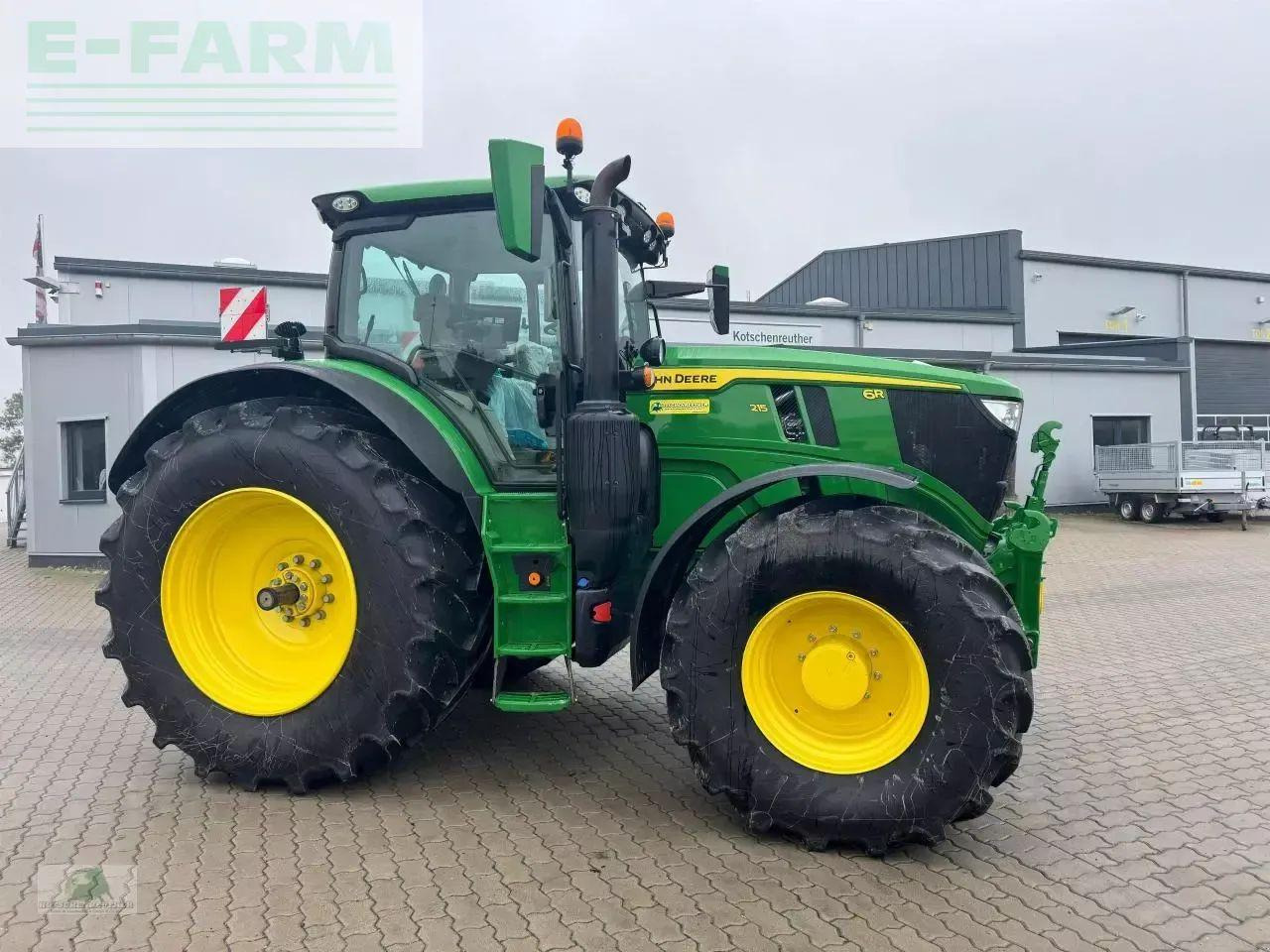 John Deere 6r 215 - Трактор: фото 1 John Deere 6r 215 - Трактор: фото 1