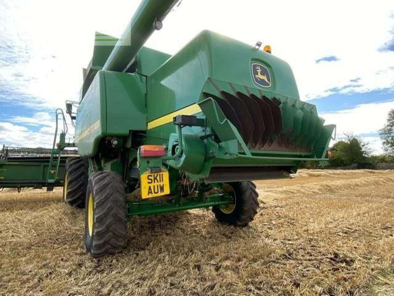 John Deere T670 4WD - Зерноуборочный комбайн: фото 1 John Deere T670 4WD - Зерноуборочный комбайн: фото 1