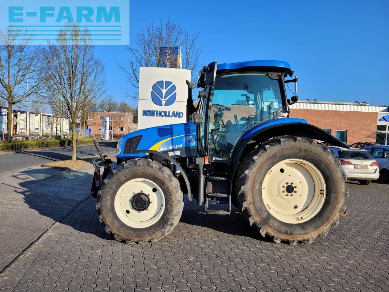 New Holland t6020 elite Elite - Трактор: фото 1 New Holland t6020 elite Elite - Трактор: фото 1