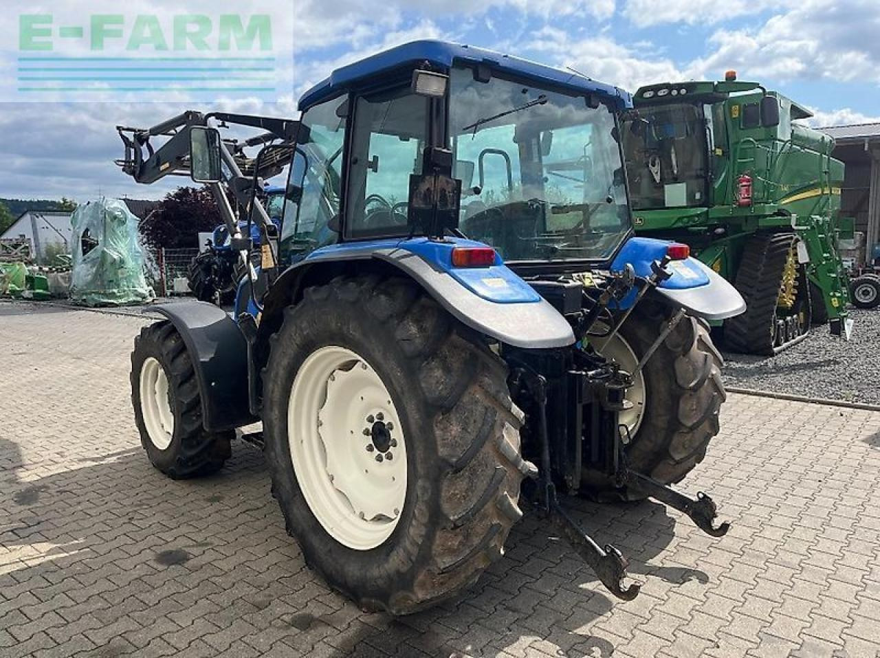New Holland tl 90 a A - Трактор: фото 4 New Holland tl 90 a A - Трактор: фото 4