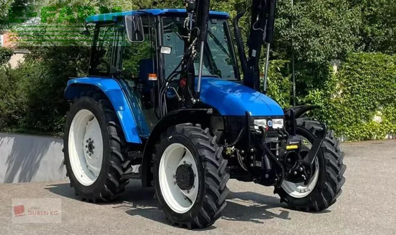 New Holland tl100 (4wd) - Трактор: фото 3 New Holland tl100 (4wd) - Трактор: фото 3