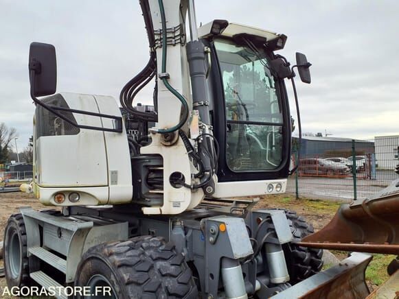 Liebherr A 910 Compact Litronic - Колёсный экскаватор: фото 1 Liebherr A 910 Compact Litronic - Колёсный экскаватор: фото 1