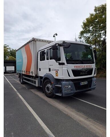 MAN Camion - Тентованный грузовик: фото 1 MAN Camion - Тентованный грузовик: фото 1