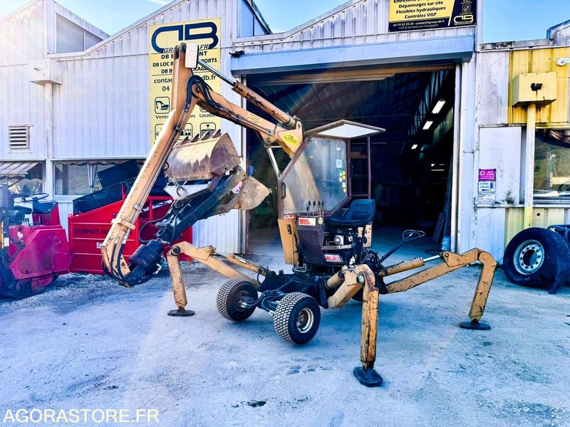PELLE ARAIGNÉE SUR PNEUS 3 ROUES - ANNEE 1986 - 1142 HEURES - Экскаватор: фото 1 PELLE ARAIGNÉE SUR PNEUS 3 ROUES - ANNEE 1986 - 1142 HEURES - Экскаватор: фото 1