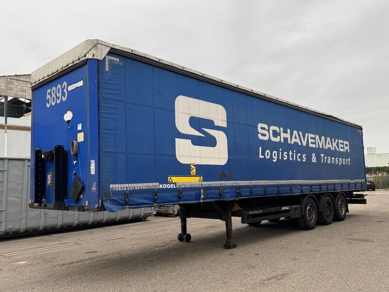 Kögel S24-1 3 AXLE SAF + SLIDING ROOF - Тентованный полуприцеп: фото 1 Kögel S24-1 3 AXLE SAF + SLIDING ROOF - Тентованный полуприцеп: фото 1