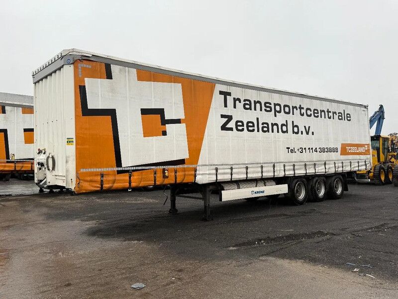Krone SD - 3 AXLE + SLIDING ROOF - Тентованный полуприцеп: фото 1 Krone SD - 3 AXLE + SLIDING ROOF - Тентованный полуприцеп: фото 1