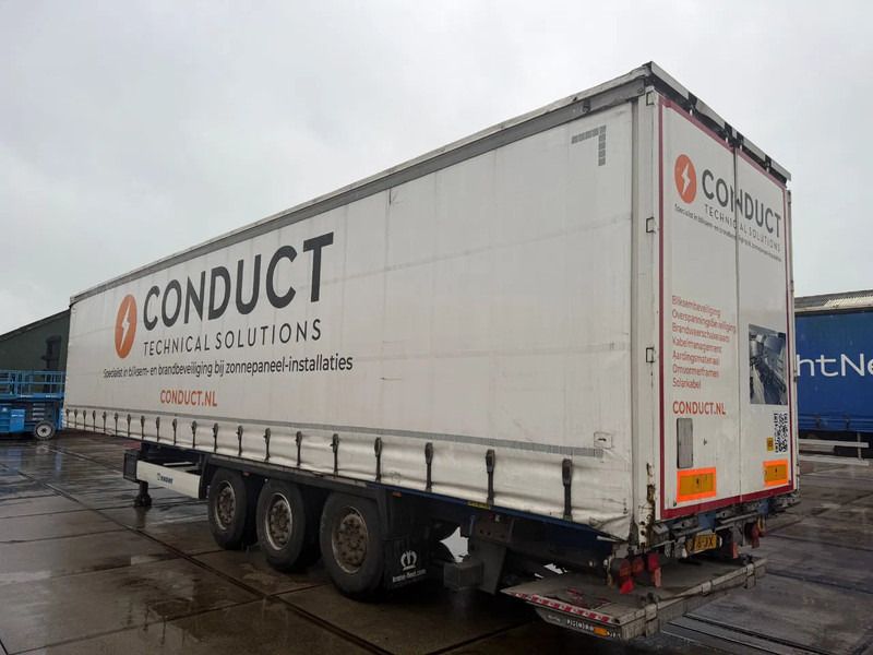 Krone SD DHOLLANDIA 2000 KG 3 AXLE SLIDING ROOF DISC BRAKES - Тентованный полуприцеп: фото 3 Krone SD DHOLLANDIA 2000 KG 3 AXLE SLIDING ROOF DISC BRAKES - Тентованный полуприцеп: фото 3