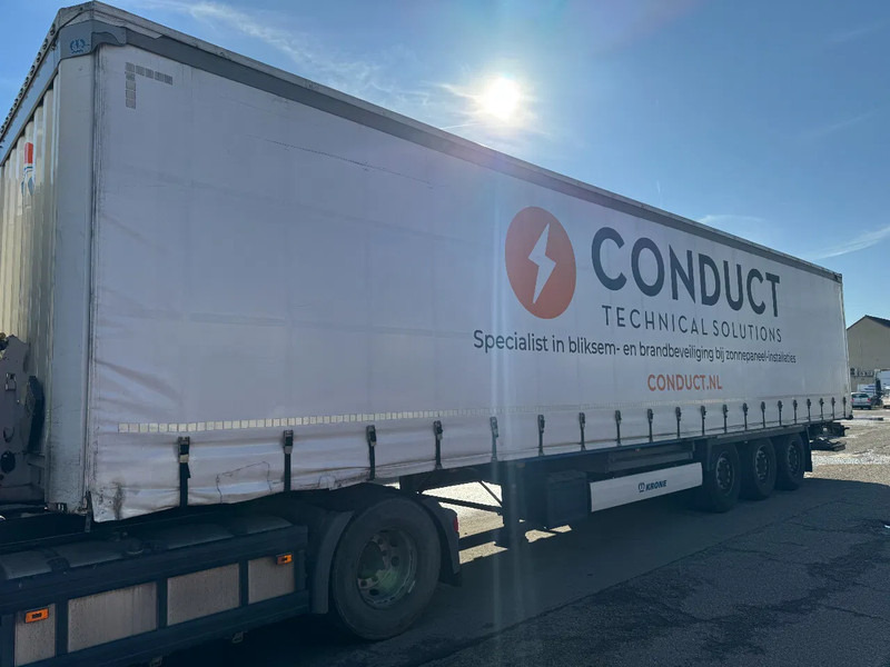 Krone SD DHOLLANDIA 2000 KG 3 AXLE SLIDING ROOF DISC BRAKES - Тентованный полуприцеп: фото 2 Krone SD DHOLLANDIA 2000 KG 3 AXLE SLIDING ROOF DISC BRAKES - Тентованный полуприцеп: фото 2