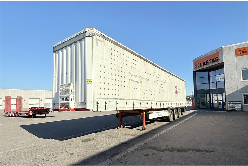 Krone 34 pl. - Тентованный полуприцеп: фото 1 Krone 34 pl. - Тентованный полуприцеп: фото 1