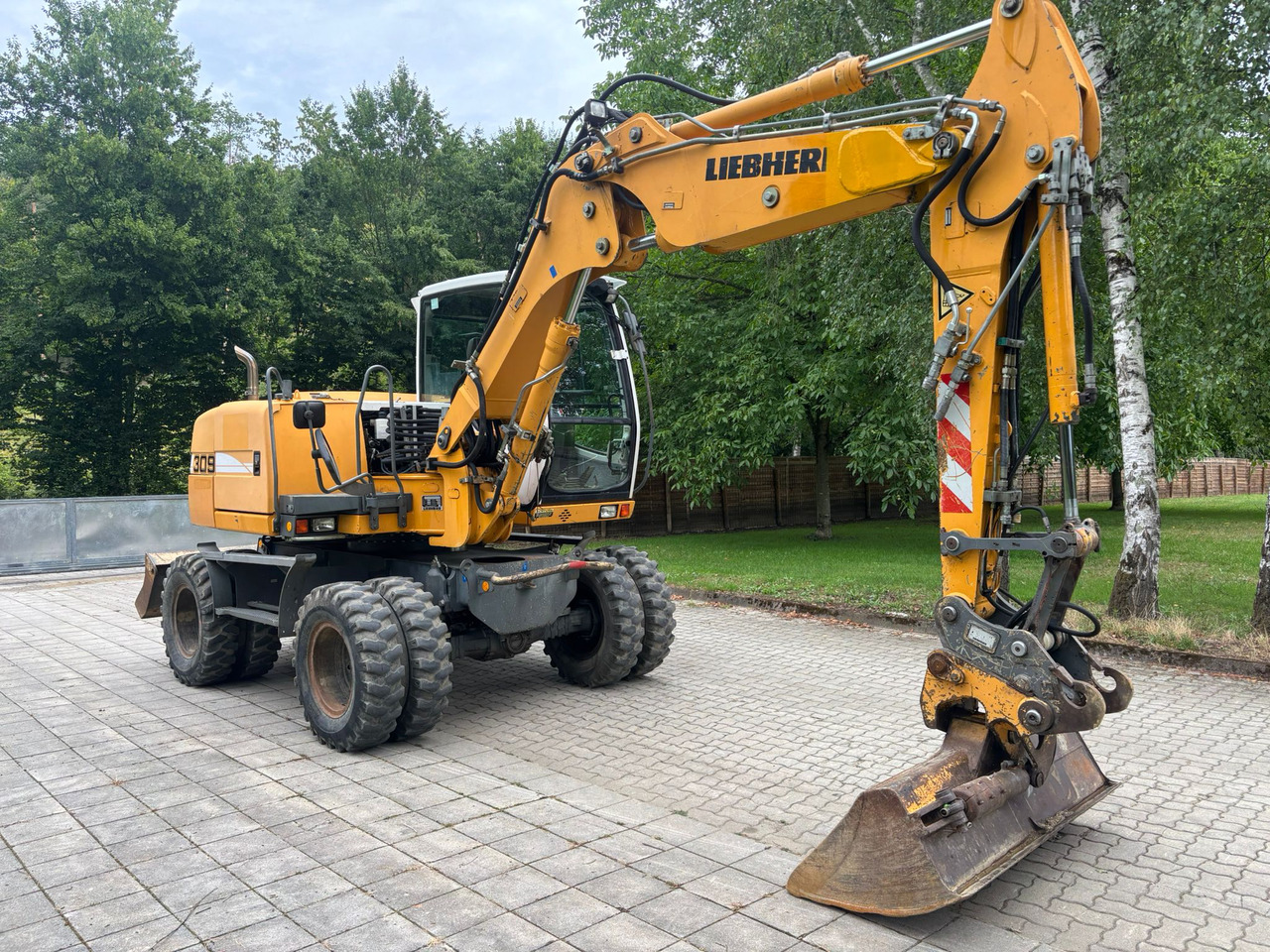 LIEBHERR A 309 Litronic - Колёсный экскаватор: фото 4 LIEBHERR A 309 Litronic - Колёсный экскаватор: фото 4