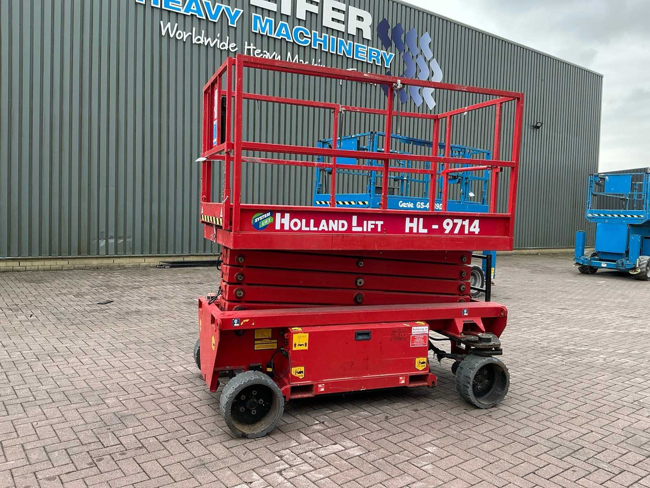 Holland lift HL-9714 - Подъёмник: фото 1 Holland lift HL-9714 - Подъёмник: фото 1