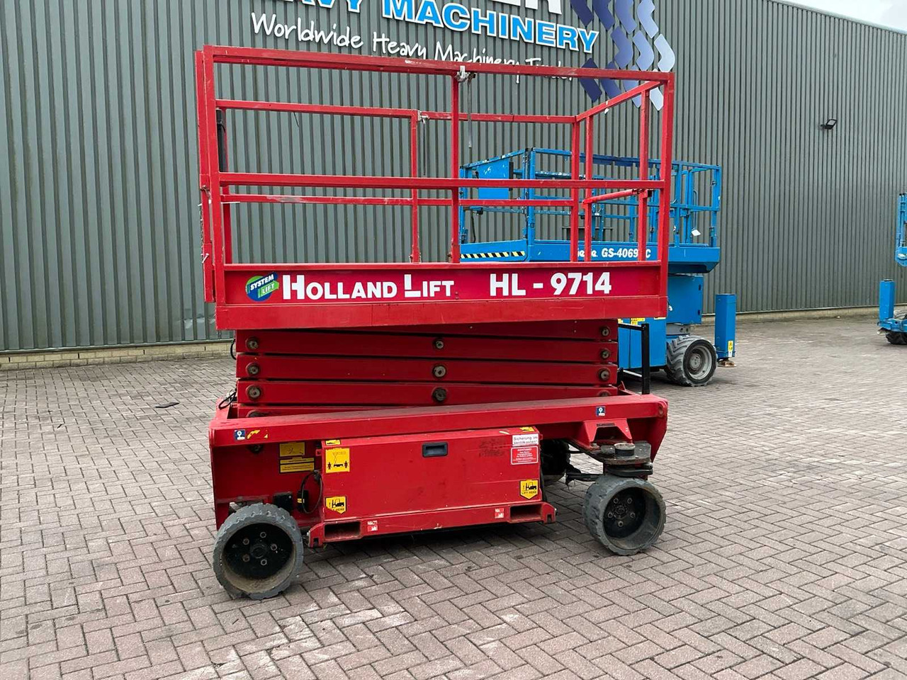Holland lift HL-9714 - Подъёмник: фото 2 Holland lift HL-9714 - Подъёмник: фото 2