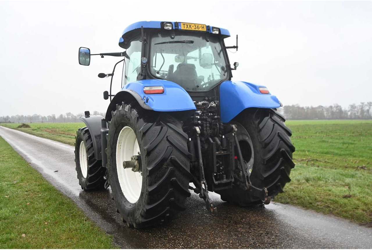 NEW HOLLAND - 2007 - T7030 - ALL-WHEEL DRIVE FARM TRACTOR - Трактор: фото 5 NEW HOLLAND - 2007 - T7030 - ALL-WHEEL DRIVE FARM TRACTOR - Трактор: фото 5
