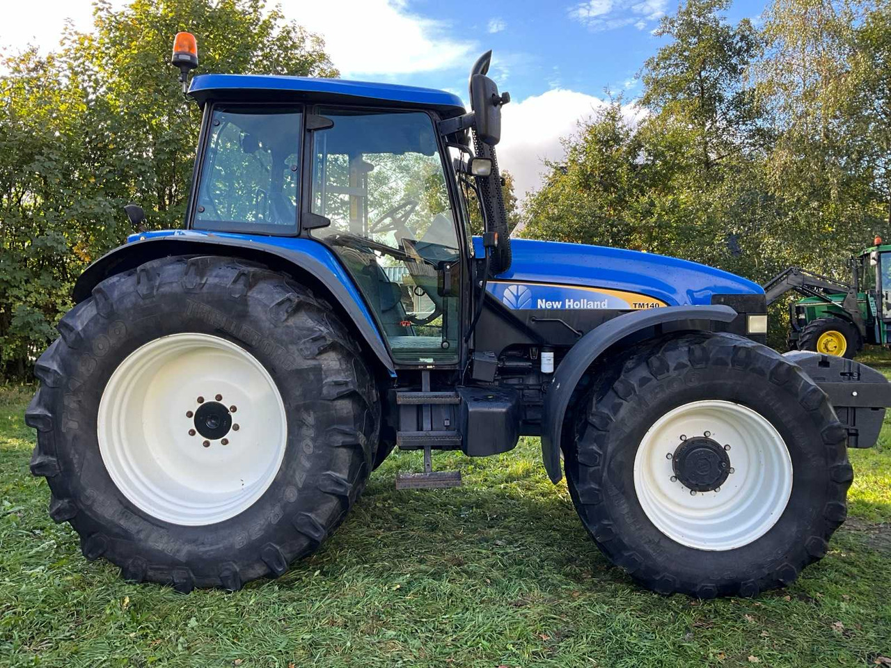New holland TM140 - Трактор: фото 5 New holland TM140 - Трактор: фото 5