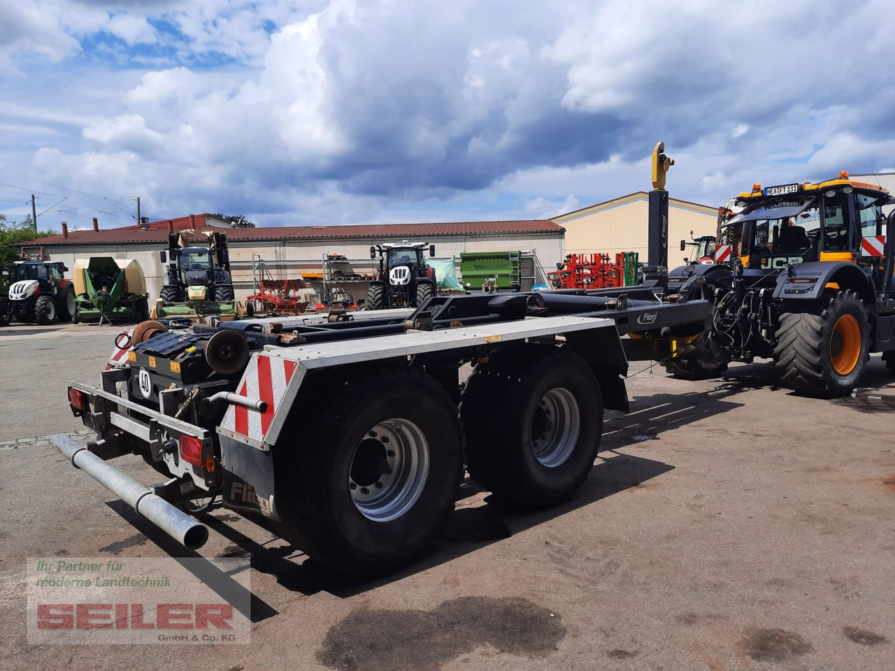 Fliegl HKL 22 Tandem - Прицеп мультилифт/ Бункеровоз: фото 1 Fliegl HKL 22 Tandem - Прицеп мультилифт/ Бункеровоз: фото 1