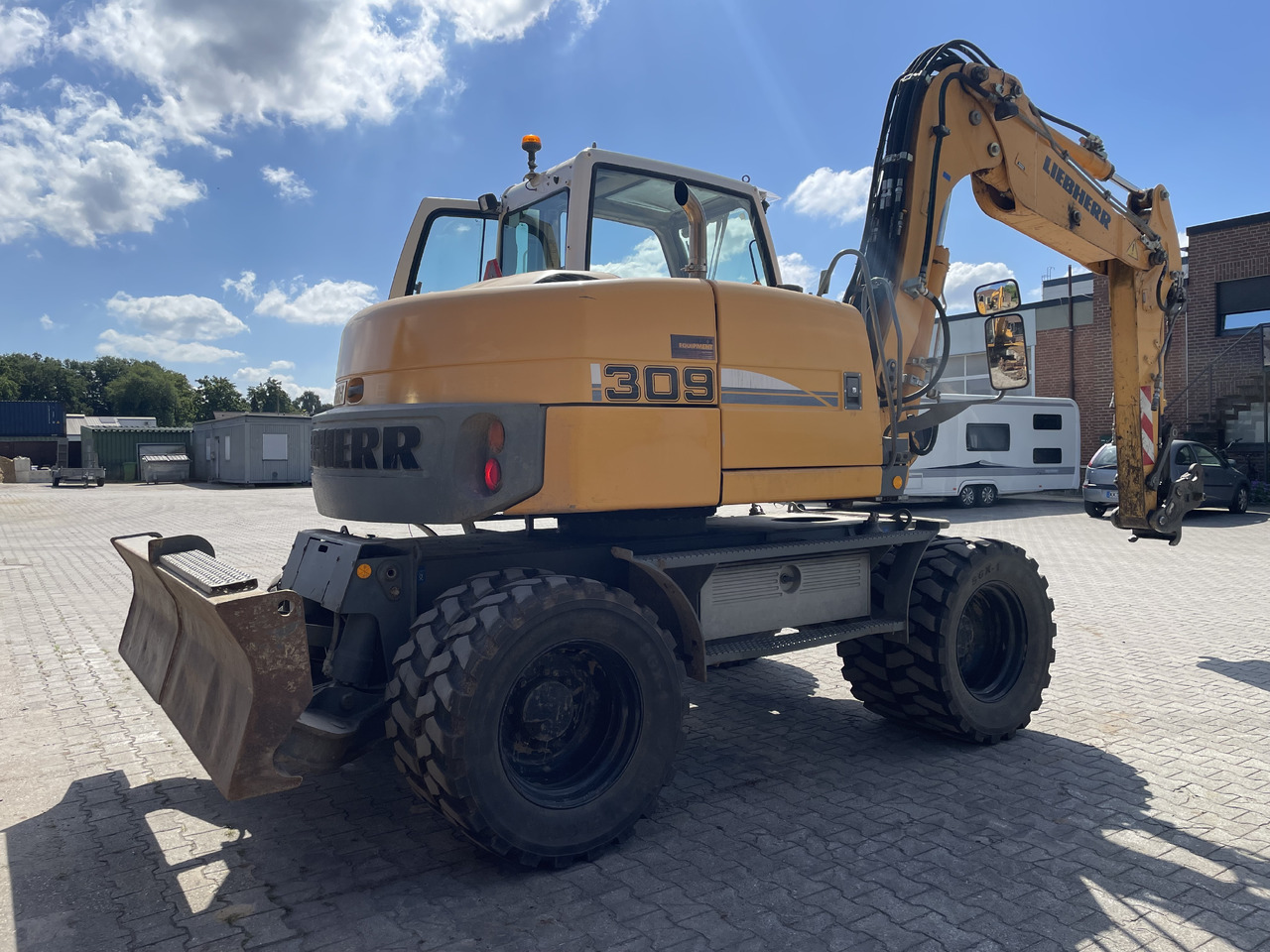 Liebherr A309 - Колёсный экскаватор: фото 3 Liebherr A309 - Колёсный экскаватор: фото 3