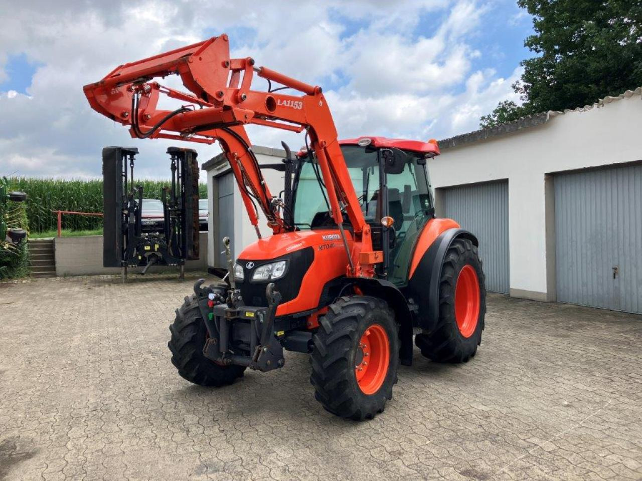 Kubota 7040 Hydro-Shift - Трактор: фото 1 Kubota 7040 Hydro-Shift - Трактор: фото 1