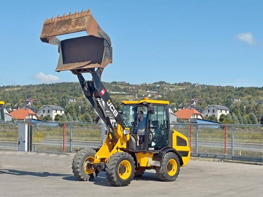 JCB 406 t4 * RADLADER * 4x4 * TOPZUSTAND - Колёсный погрузчик: фото 1 JCB 406 t4 * RADLADER * 4x4 * TOPZUSTAND - Колёсный погрузчик: фото 1