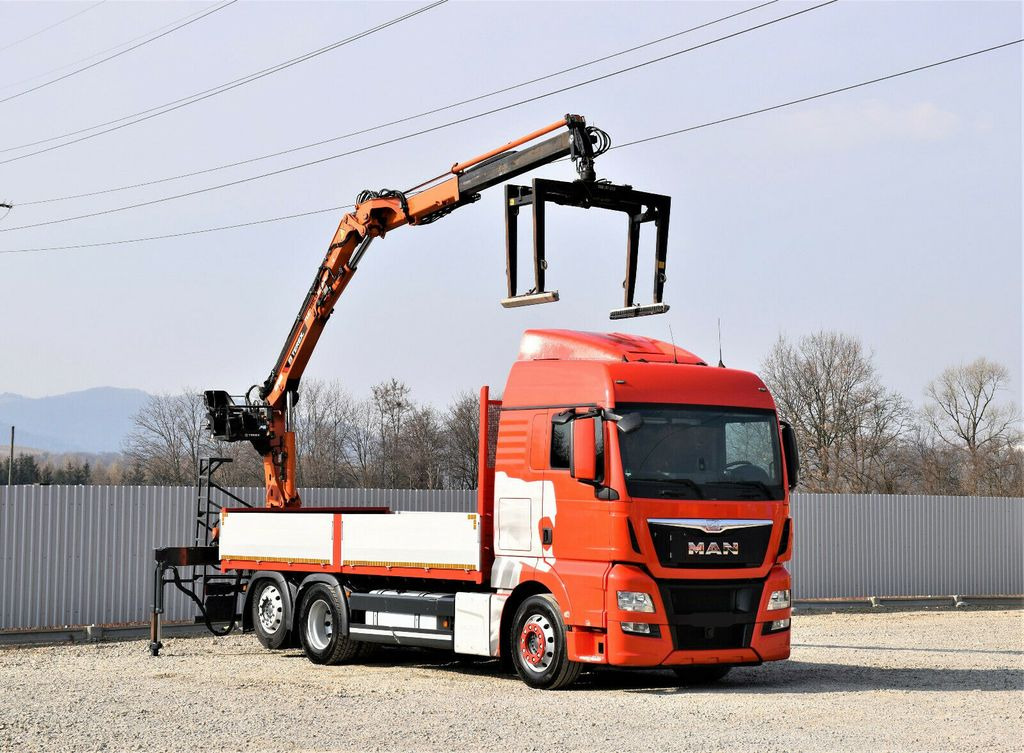MAN TGX 26.440 Pritsche 6,60 m*TEREX 135.2-A11 - Автоманипулятор: фото 1 MAN TGX 26.440 Pritsche 6,60 m*TEREX 135.2-A11 - Автоманипулятор: фото 1