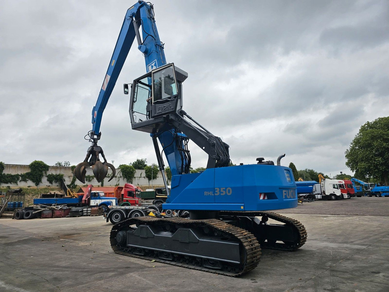 Fuchs RHL 350 Umschlagbagger Mit Verstellbare Raupen - Бульдозер: фото 4 Fuchs RHL 350 Umschlagbagger Mit Verstellbare Raupen - Бульдозер: фото 4