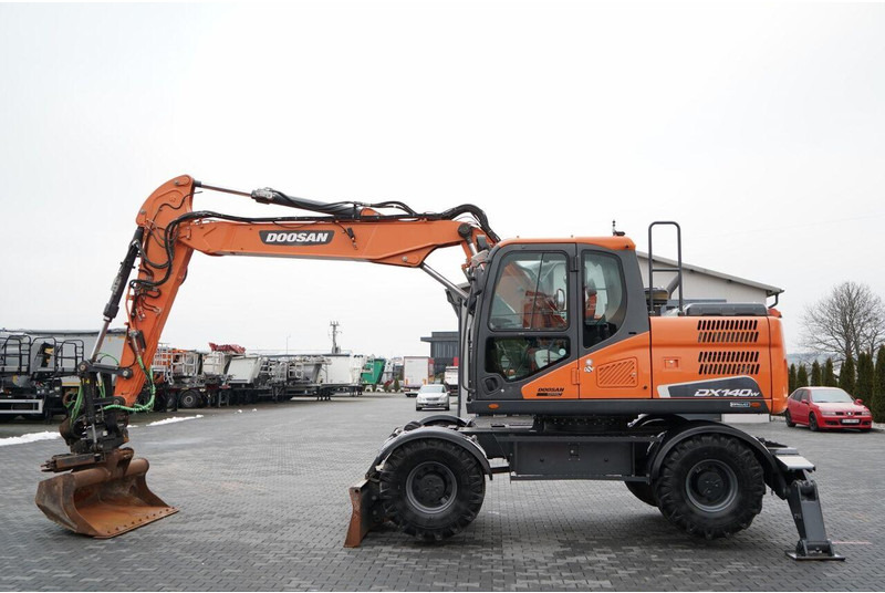 Doosan DX 140W - Колёсный экскаватор: фото 2 Doosan DX 140W - Колёсный экскаватор: фото 2