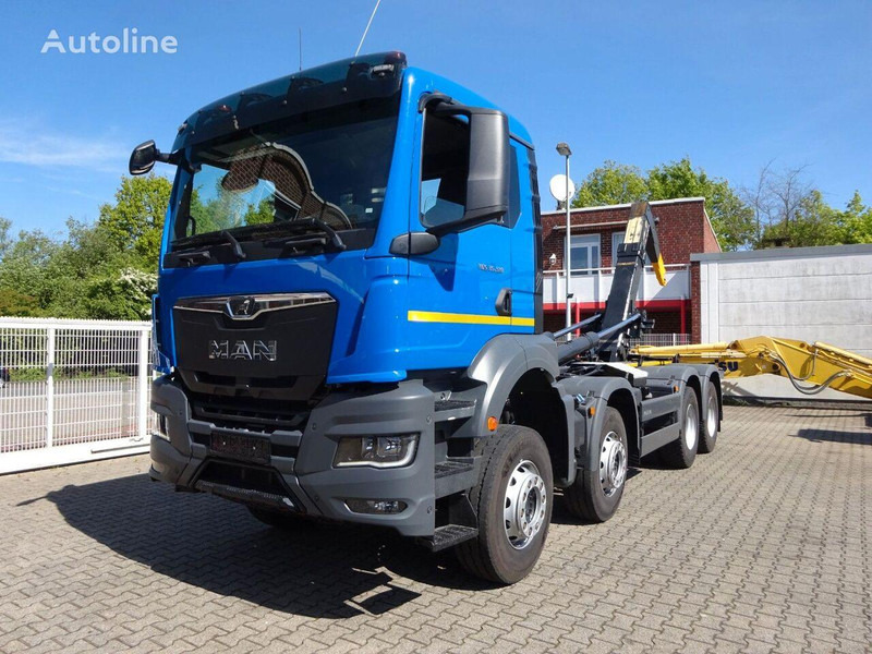 MAN TGS 35.510 Hook lift truck 8x4 - Крюковой мультилифт: фото 1 MAN TGS 35.510 Hook lift truck 8x4 - Крюковой мультилифт: фото 1