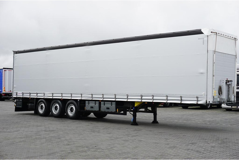 Schmitz Cargobull FIRANKA / MULTI LOCK / XL / OŚ PODNOSZONA - Тентованный полуприцеп: фото 4 Schmitz Cargobull FIRANKA / MULTI LOCK / XL / OŚ PODNOSZONA - Тентованный полуприцеп: фото 4