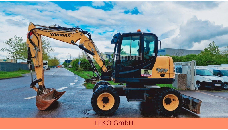 Yanmar B 95W Mit Drei Löffeln und Ein Hammer - Колёсный экскаватор: фото 4 Yanmar B 95W Mit Drei Löffeln und Ein Hammer - Колёсный экскаватор: фото 4