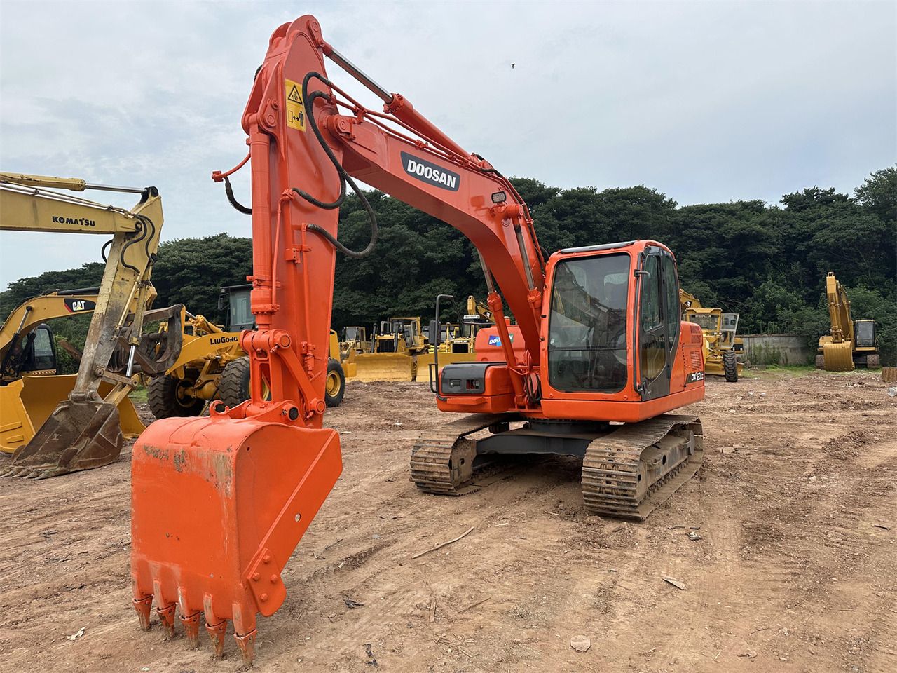 Doosan DX120 - Гусеничный экскаватор: фото 2 Doosan DX120 - Гусеничный экскаватор: фото 2